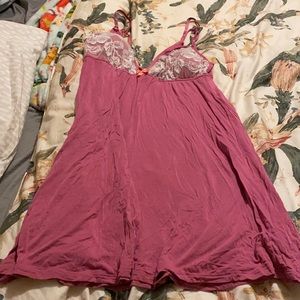 I am selling a Victoria secret slip dress.color pink with white lace size S